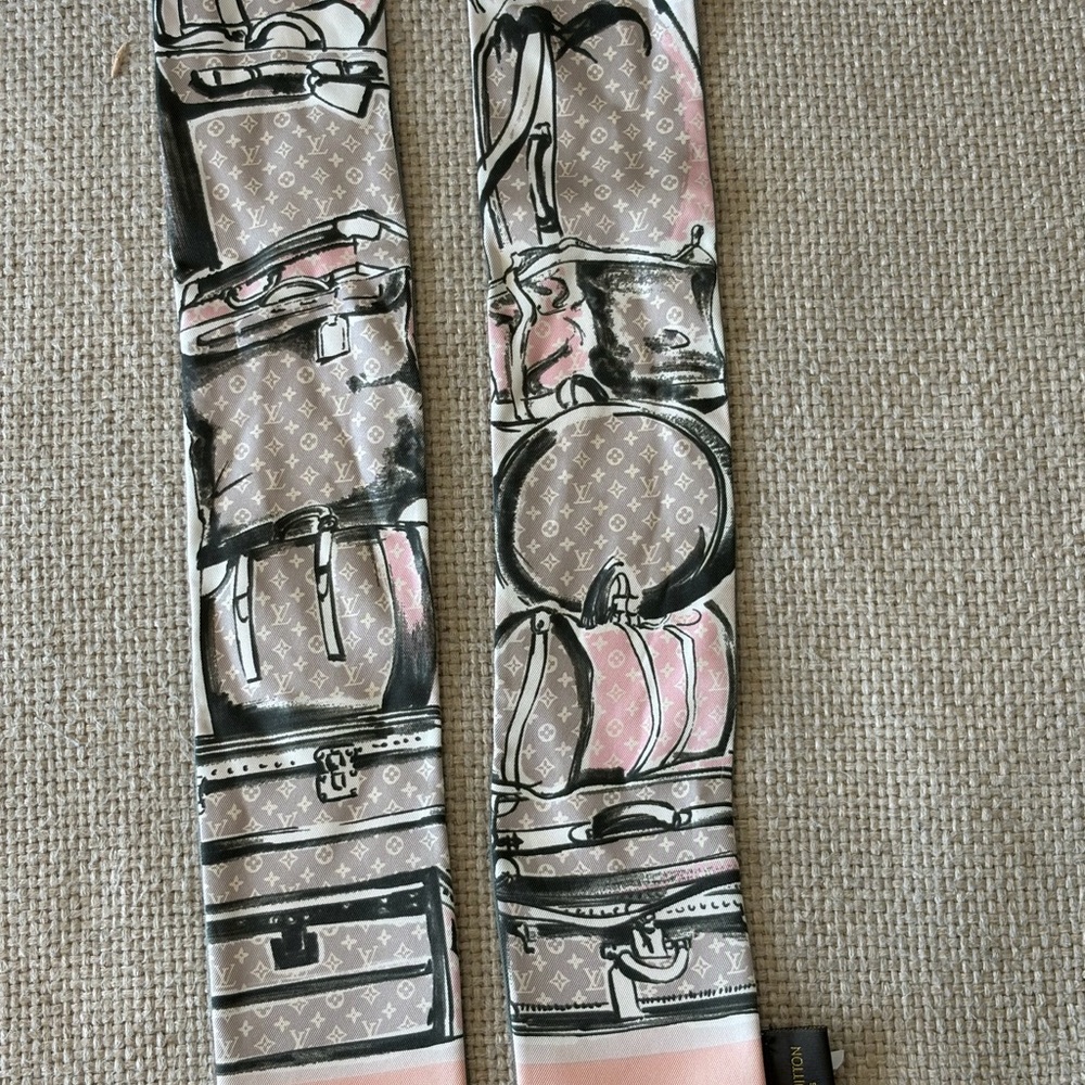 Louis Vuitton Trunks Bandeau, a signature silk scarf accessory.